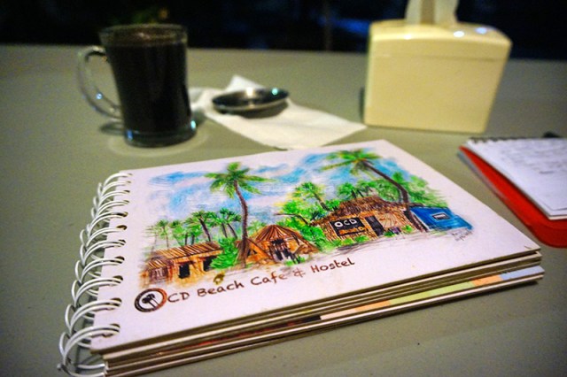 Buku menu bersampul sketsa berwarna karya Tayuko Matsumura, pejalan asal Jepang yang jatuh cinta dengan Kupang